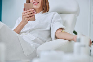 woman getting vitamin drip therapy