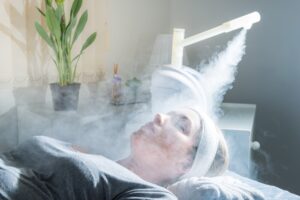 A woman receiving Ozone Therapy at a health and wellness clinic.