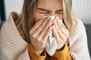 Woman having a very heavy flu.