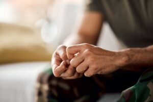 Closeup of person hands, anxiety and mental health problem, therapy and psychology with trauma.