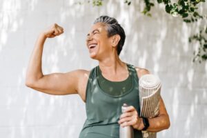 A woman feeling strong after her workout.