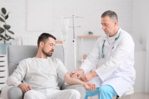 man getting iv therapy